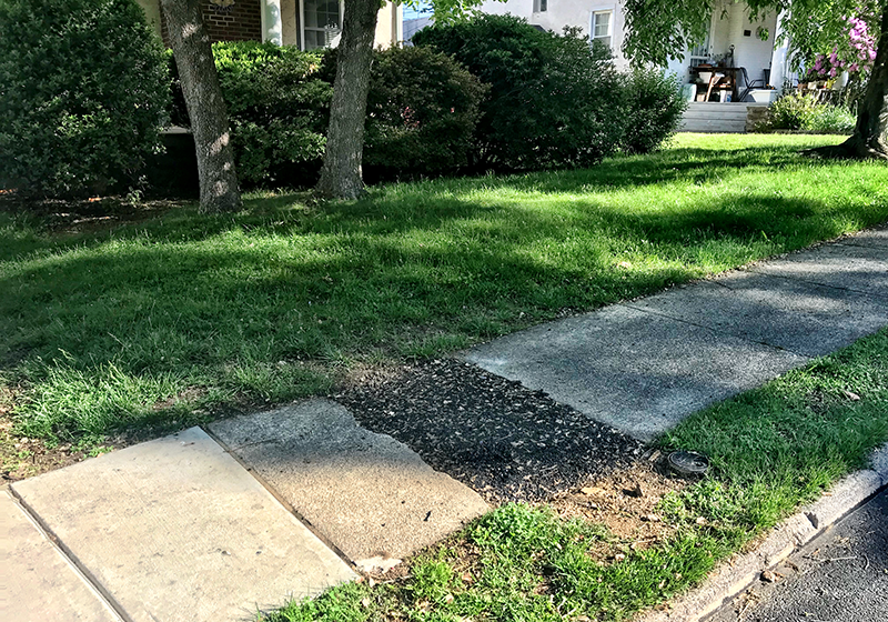 The sidewalk patch in front of the home of Jay Conners was done by the Borough.